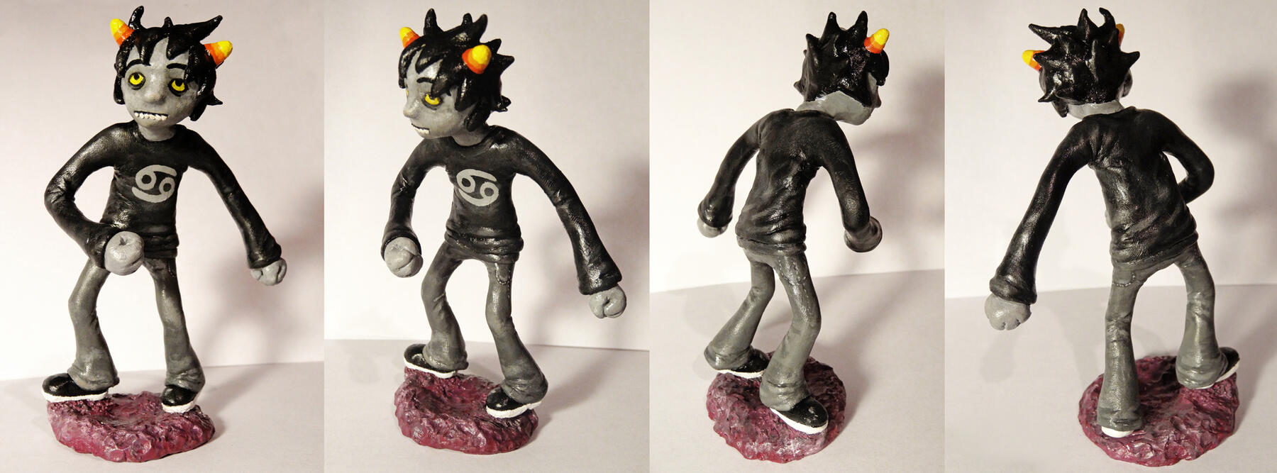 Photos of a Karkat Vantas sculpture from the webcomic Homestuck.