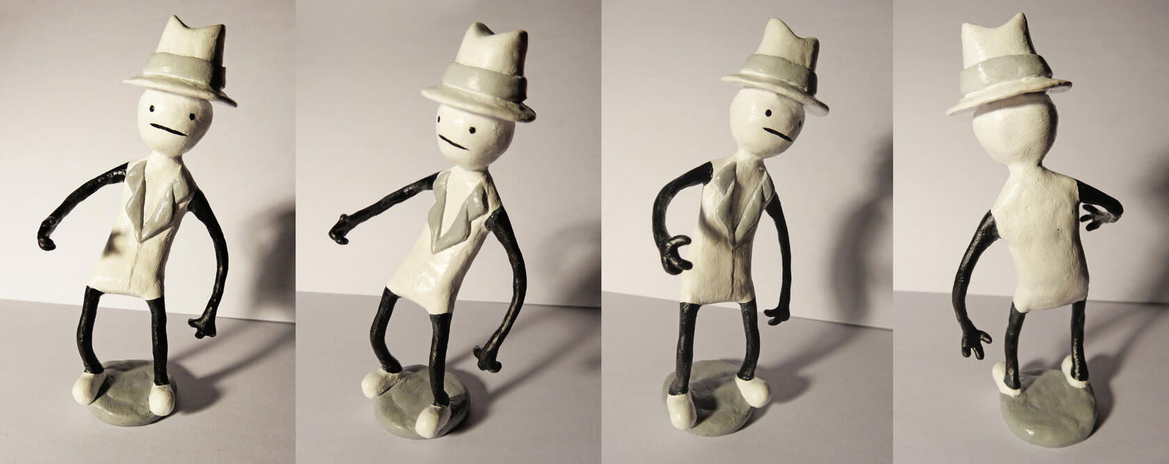 Photos of a Problem Sleuth sculpture from the webcomic website MS Paint Adventures.